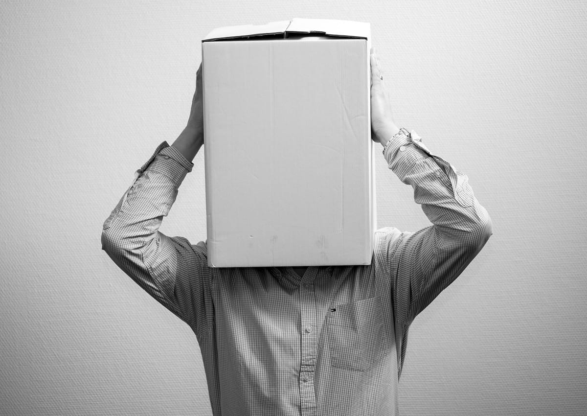 person with box on head